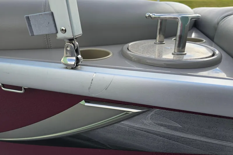 Slide: The Image of 2017 Premier 220 SunSation boat interior with plush seating and table. - 15