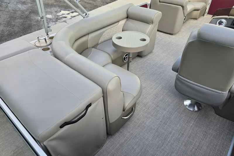 Slide: The Image of Luxurious seating area on 2017 Premier 220 SunSation pontoon boat with cupholders. - 16