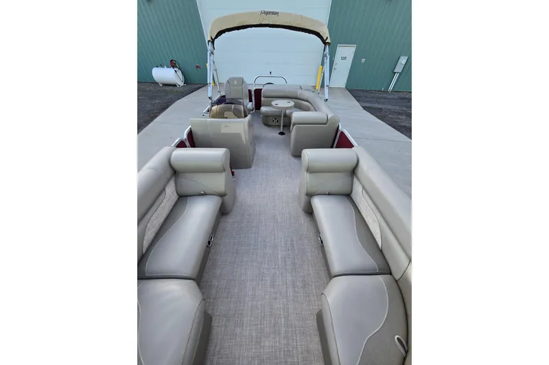 Slide: The Image of 2017 Premier 220 SunSation boat interior with steering console and seating. - 28