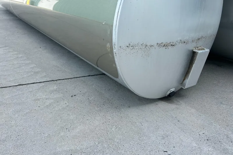 Slide: The Image of 2017 Premier 220 SunSation pontoon boat interior with gray seating and modern design. - 39