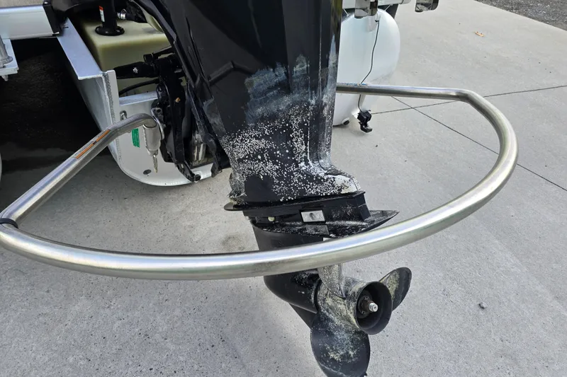 Slide: The Image of Outboard motor with propeller guard on a 2017 Premier 220 SunSation boat. - 4