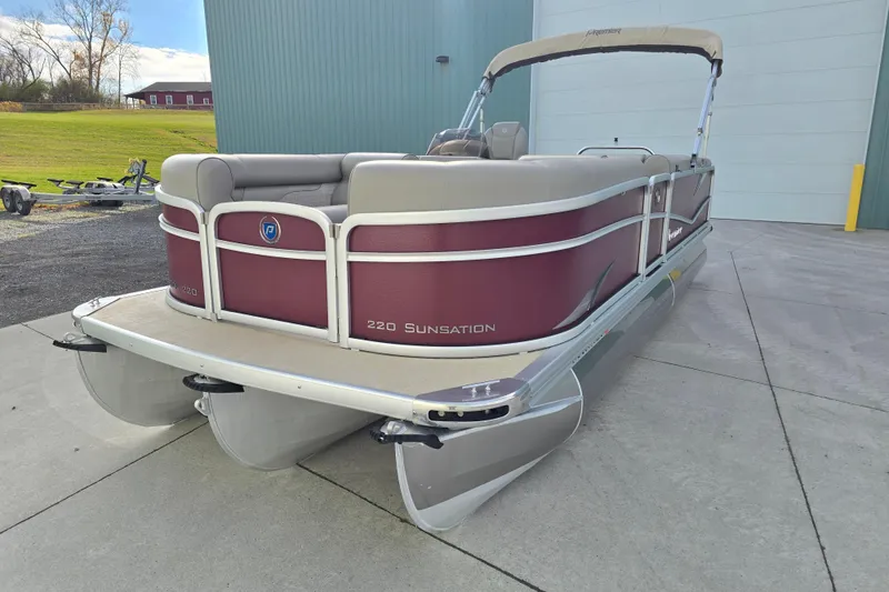 Slide: The Image of Close-up of 2017 Premier 220 SunSation pontoon boat's aluminum siding and railing. - 9