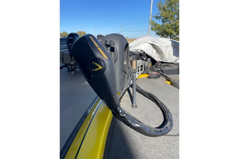 Slide: The Image of 2008 Skeeter 20i boat with trolling motor on deck, sunny day. - 5