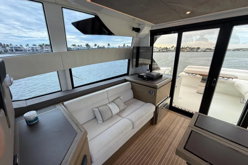 Slide: The Image of Luxurious interior of 2018 Beneteau Gran Turismo 50 yacht with waterfront view. - 24