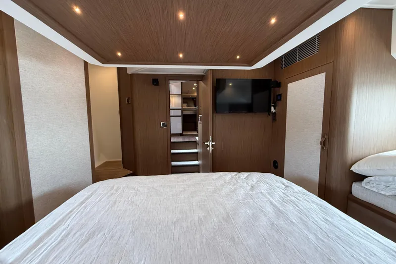 Slide: The Image of Luxurious interior of 2018 Beneteau Gran Turismo 50 yacht cabin with modern amenities. - 48