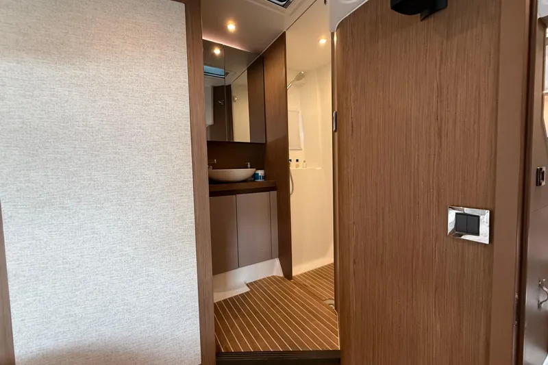 Slide: The Image of Interior of 2018 Beneteau Gran Turismo 50 yacht, featuring a modern bathroom design. - 50
