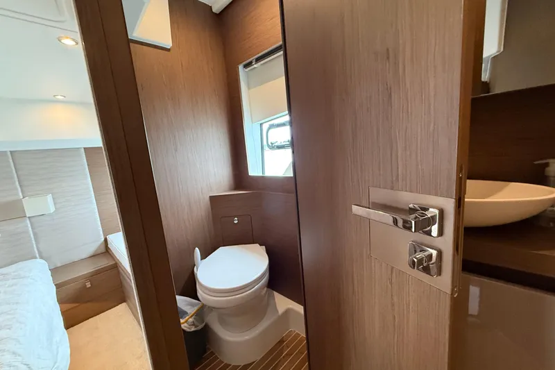 Slide: The Image of Luxurious bathroom interior of 2018 Beneteau Gran Turismo 50 yacht, featuring modern fixtures. - 52
