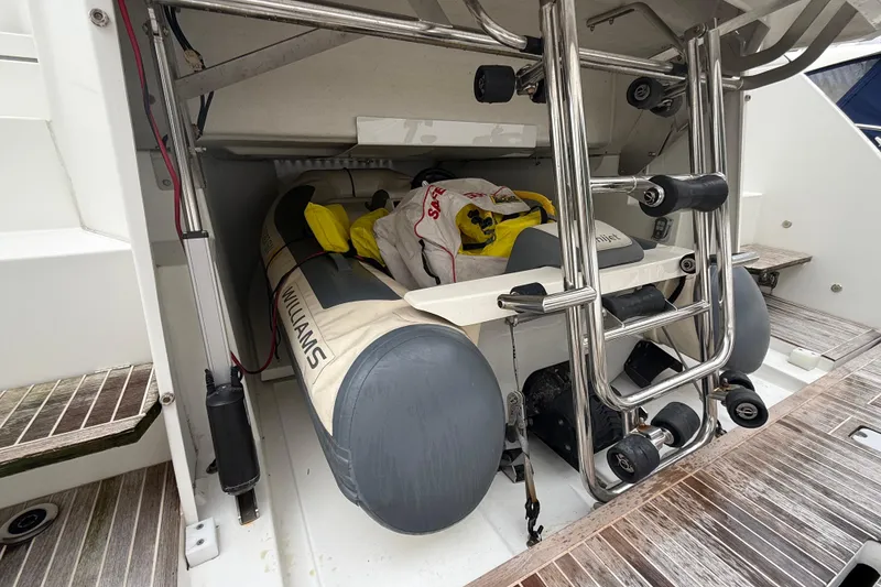 Slide: The Image of Storage compartment of 2018 Beneteau Gran Turismo 50 with inflatable boat and equipment. - 71