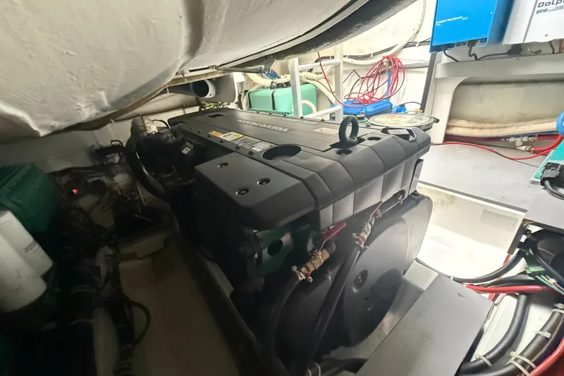 Slide: The Image of Engine room of 2018 Beneteau Gran Turismo 50 yacht, showcasing machinery and equipment. - 75