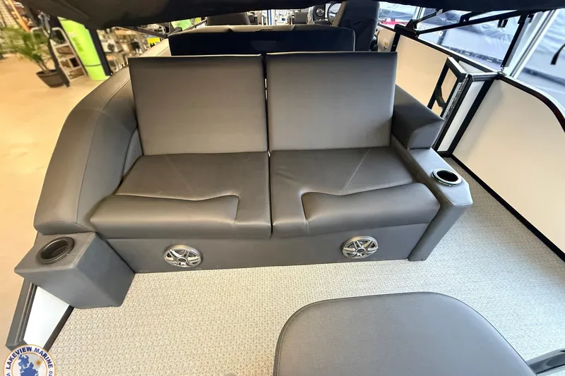 Slide: The Image of Luxurious seating in 2026 Evotti 523CS boat with cup holders and integrated speakers. - 15