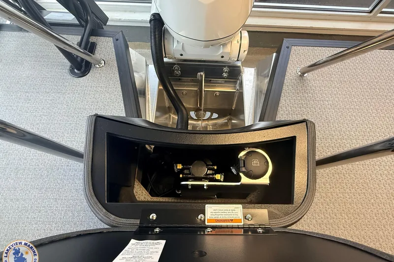 Slide: The Image of Interior view of 2026 Evotti 523CS boat, showcasing control panel and steering mechanism. - 17