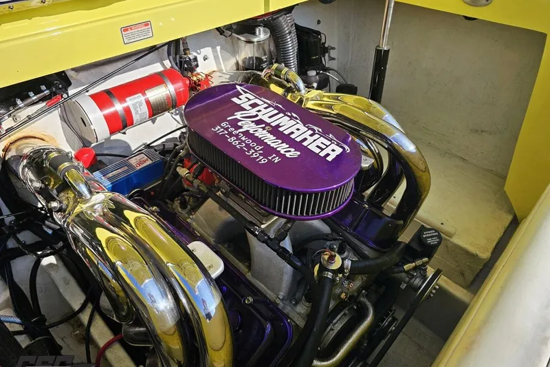 Slide: The Image of 2005 Baja 25 Outlaw engine with Schumacher performance parts and chrome headers. - 110