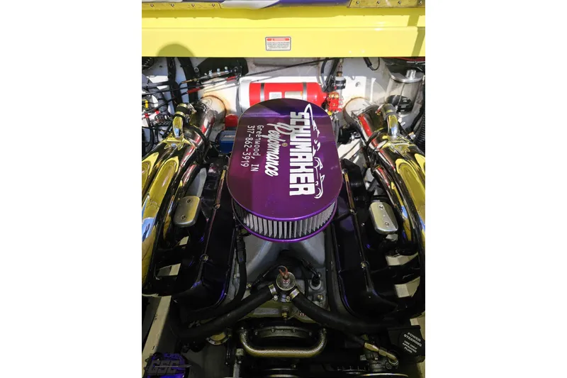 Slide: The Image of Engine of a 2005 Baja 25 Outlaw boat with Schumacher performance parts. - 114