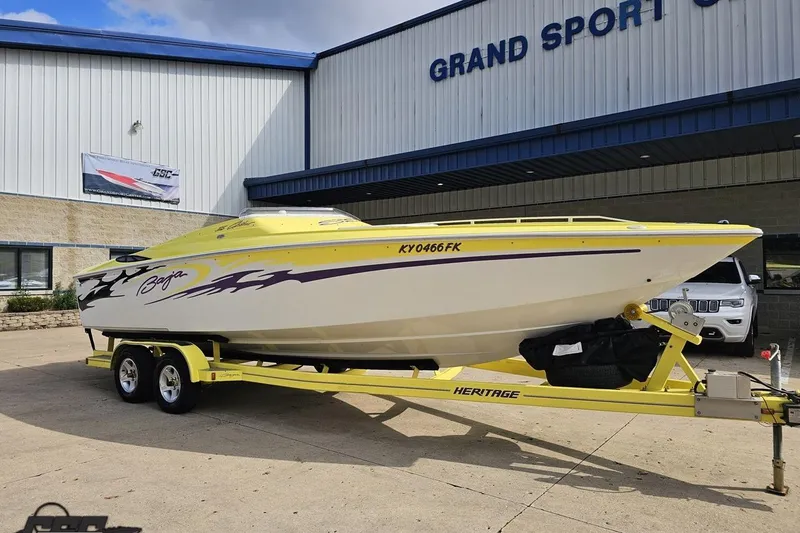 Slide: The Image of 2005 Baja 25 Outlaw speedboat on trailer outside Grand Sport Center. - 22