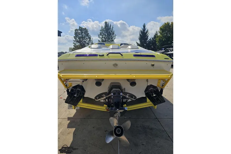 Slide: The Image of Rear view of a 2005 Baja 25 Outlaw boat with dual propellers. - 46
