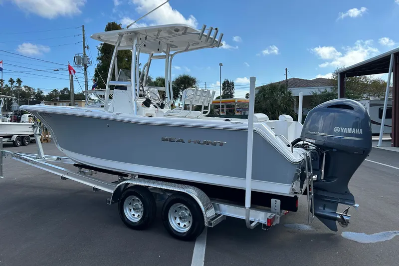 Slide: The Image of 2016 Sea Hunt Triton 225 boat on trailer with Yamaha outboard motor. - 4