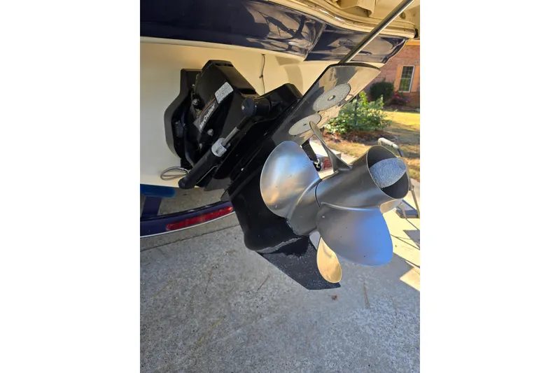 Slide: The Image of Boat propeller of a 2006 Azure AZ 220, parked on a driveway. - 35