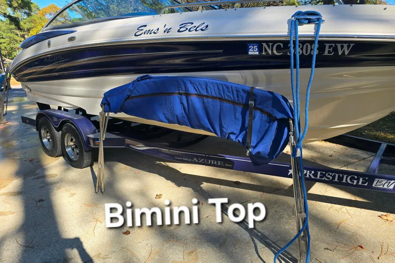 Slide: The Image of Azure AZ 220 boat with Bimini top on trailer, 2006 model. - 6