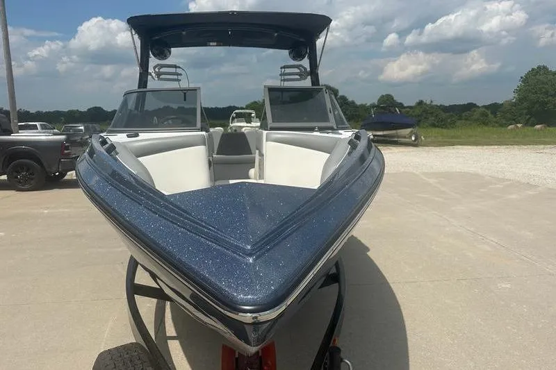 Slide: The Image of 2020 Tigé R23 boat with sleek design on a sunny day. - 10