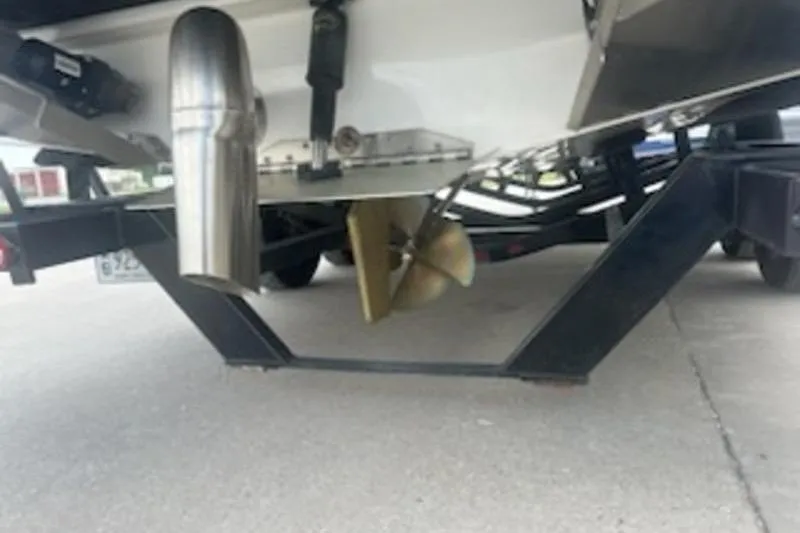 Slide: The Image of 2020 Tigé R23 boat propeller and exhaust system on trailer. - 13