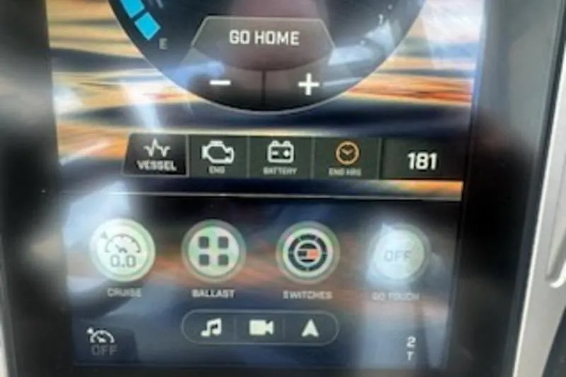 Slide: The Image of Touchscreen display of a 2020 Tigé R23 boat showing vessel controls and settings. - 7