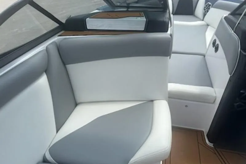 Slide: The Image of 2020 Tigé R23 boat interior with gray and white seating, modern design. - 8