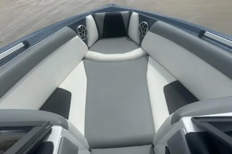 Slide: The Image of 2020 Tigé R23 boat interior with gray and white seating. - 9