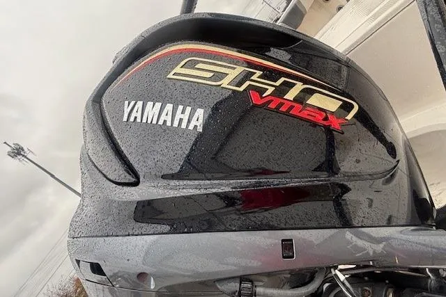 Slide: The Image of 2021 Robalo R230 Center Console boat dashboard with Garmin navigation system. - 6