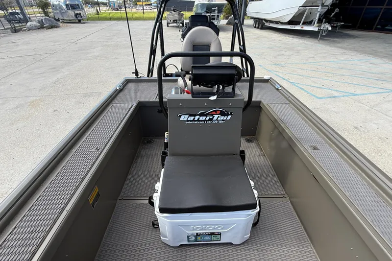 Slide: The Image of 2022 Gator Tail Extreme 1860cc boat interior with seating and storage. - 15