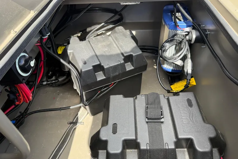 Slide: The Image of Interior view of a 2022 Gator Tail Extreme 1860cc boat showing battery and wiring setup. - 20