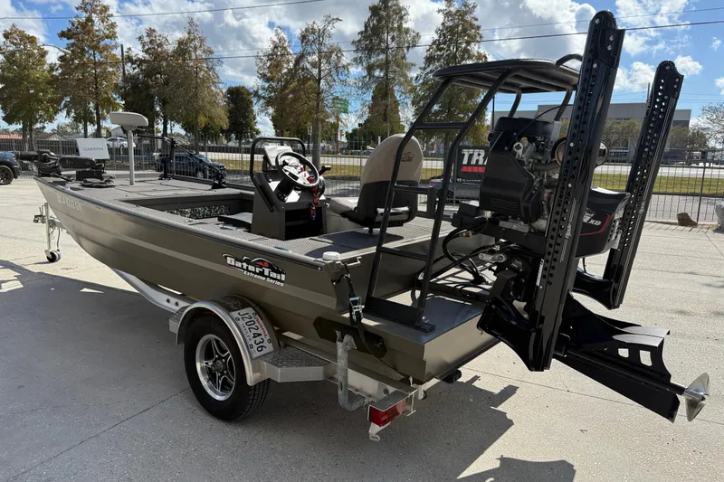 Slide: The Image of 2022 Gator Tail Extreme 1860cc boat on trailer, outdoor setting, clear sky. - 5