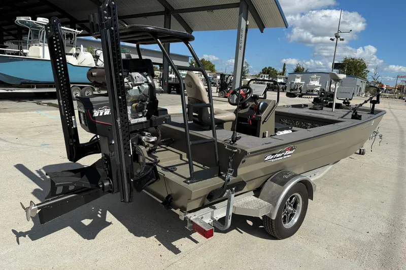 Slide: The Image of 2022 Gator Tail Extreme 1860cc boat on trailer, outdoor display under sunny sky. - 7
