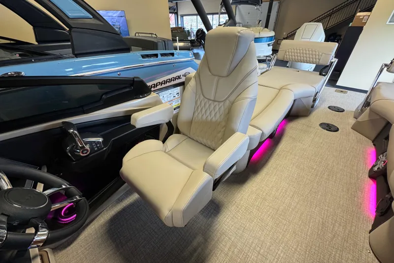 Slide: The Image of Luxurious interior of 2026 Tahoe Pontoon Grand Tahoe LTD Quad Lounge with plush seating. - 15