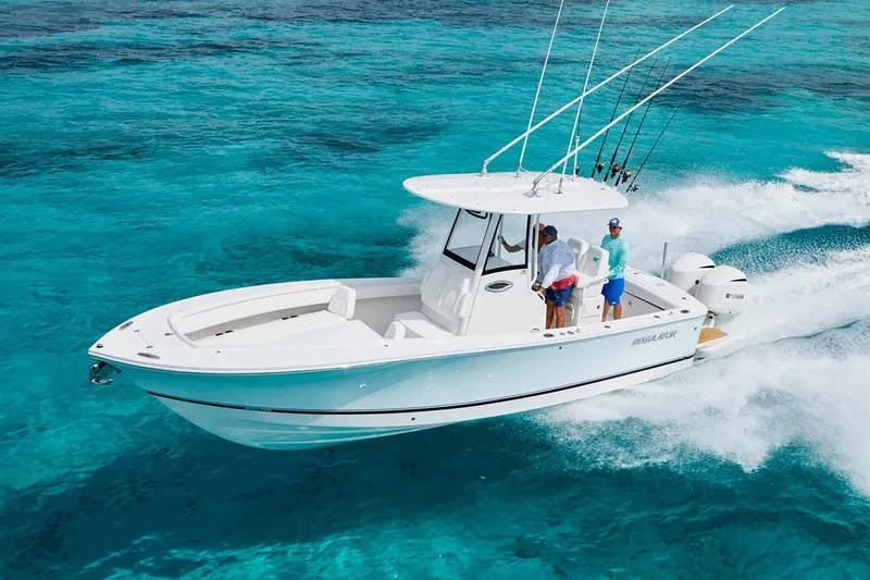 Slide: The Image of 2022 Regulator 25 boat dashboard with modern navigation and control systems. - 8