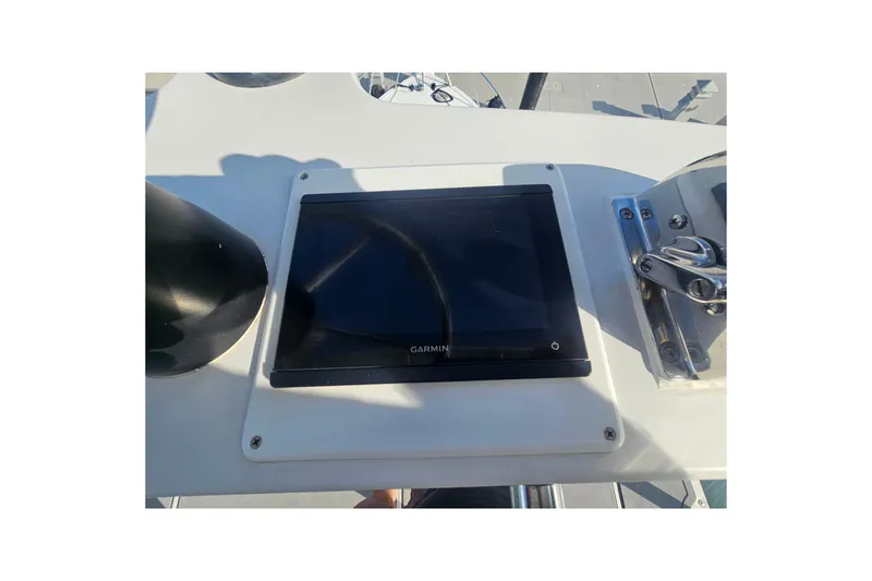 Slide: The Image of Garmin navigation display on 2003 Topaz 32 Express boat dashboard. - 18