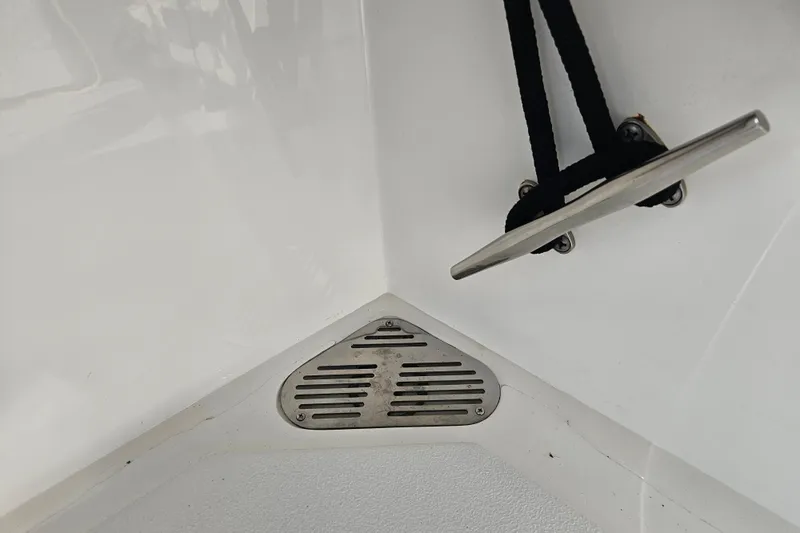 Slide: The Image of Boat deck detail with cleat and drain on 2003 Topaz 32 Express. - 19