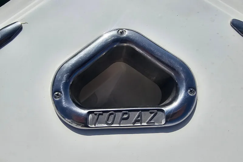 Slide: The Image of Close-up of 2003 Topaz 32 Express boat's chrome vent detail. - 23