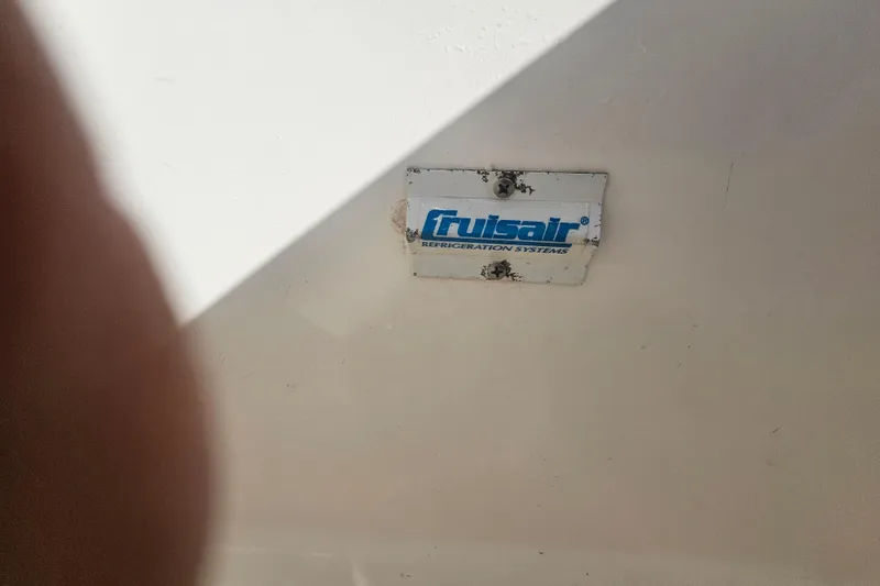 Slide: The Image of Frigibar refrigeration system label on 2003 Topaz 32 Express boat. - 28