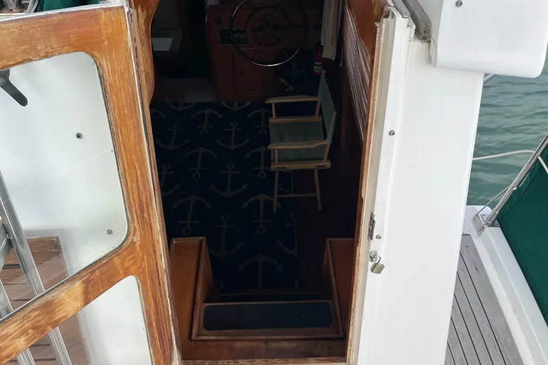 Slide: The Image of 1984 Tung Hwa Princess Aft Cabin interior with nautical-themed carpet and wooden accents. - 16