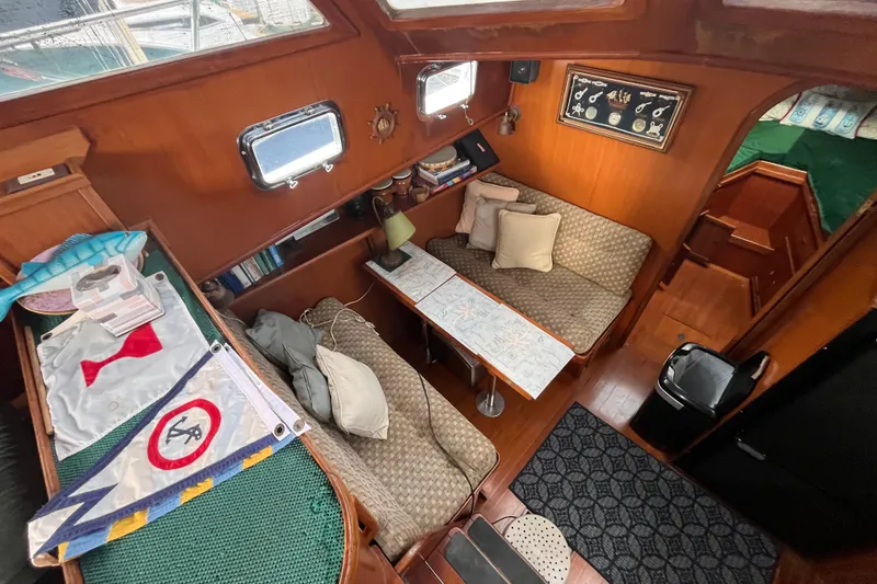 Slide: The Image of 1984 Tung Hwa Princess Aft Cabin interior with cozy seating and nautical decor. - 22