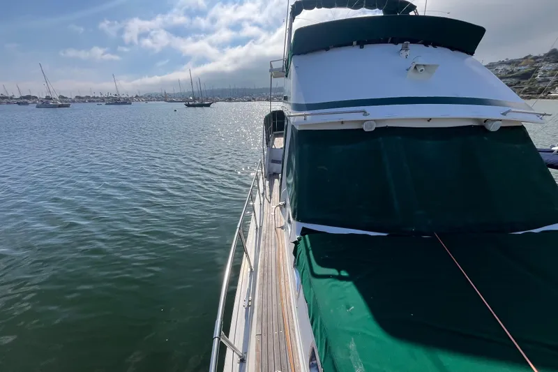 Slide: The Image of 1984 Tung Hwa Princess Aft Cabin yacht on calm waters under a partly cloudy sky. - 3