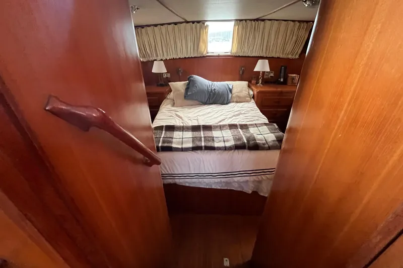 Slide: The Image of Cozy 1984 Tung Hwa Princess Aft Cabin bedroom with wood paneling and nautical decor. - 35