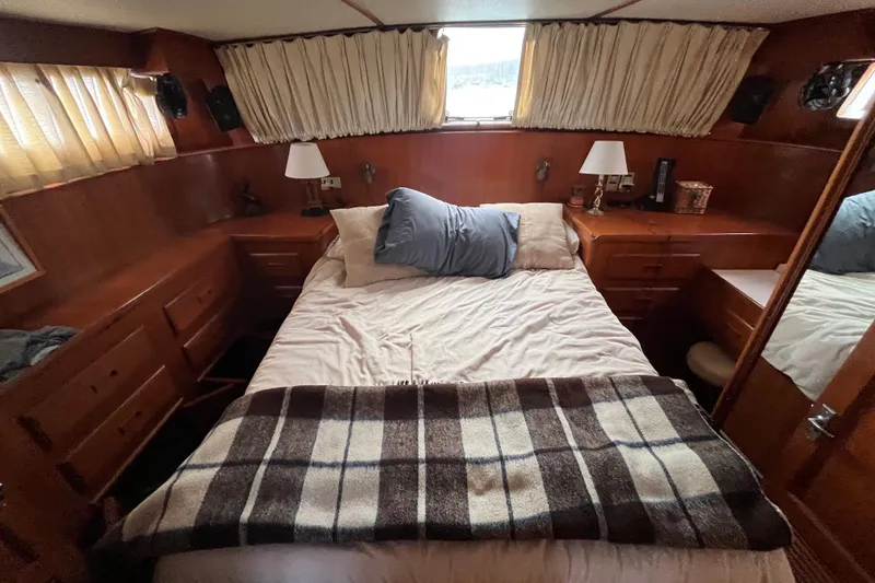 Slide: The Image of 1984 Tung Hwa Princess Aft Cabin bedroom with cozy bed, wooden interior, and soft lighting. - 36