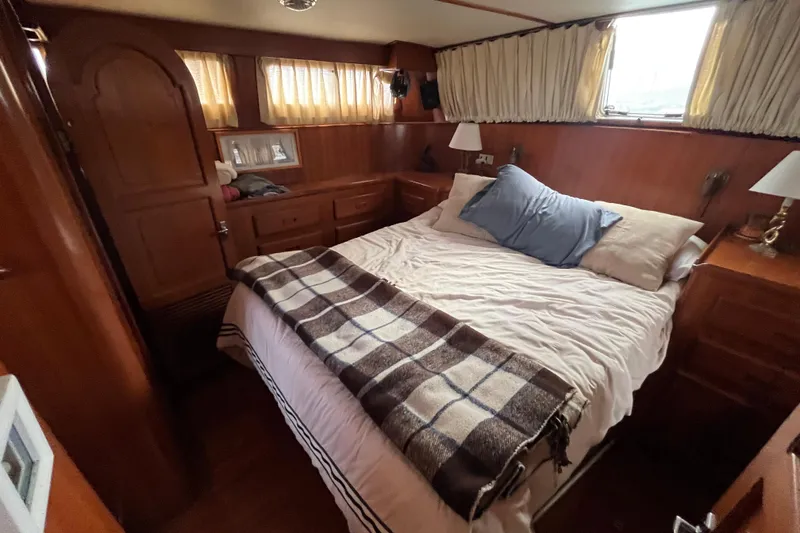 Slide: The Image of 1984 Tung Hwa Princess Aft Cabin bedroom with cozy bed and wooden interior. - 38
