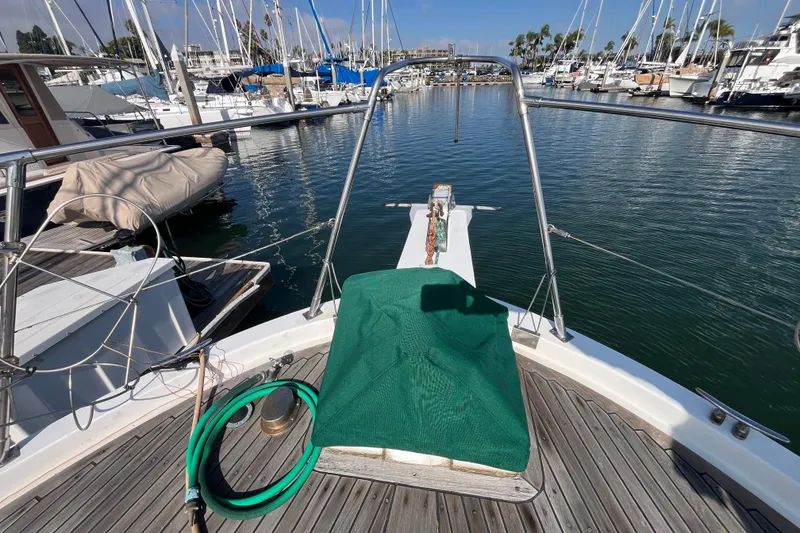 Slide: The Image of 1984 Tung Hwa Princess Aft Cabin yacht docked at marina, featuring deck and mooring equipment. - 4