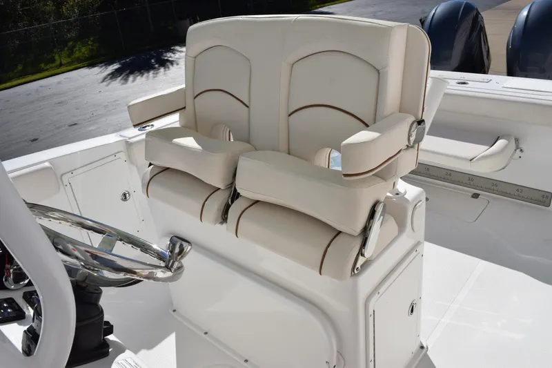 Slide: The Image of 2020 Sea Hunt Gamefish 27 boat with luxurious forward seating and dual engines. - 12