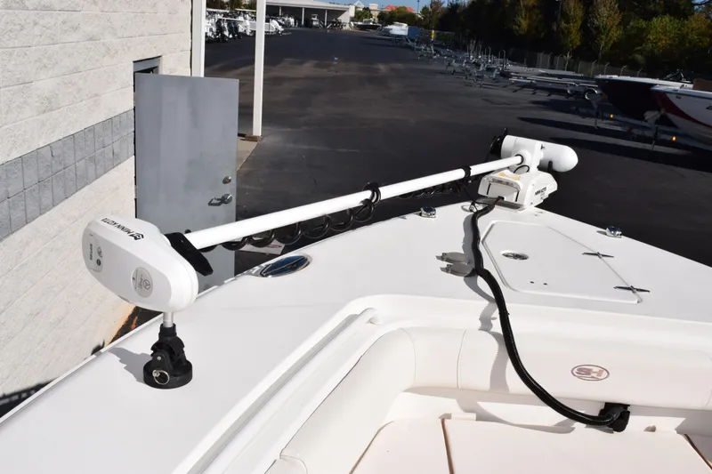 Slide: The Image of 2020 Sea Hunt Gamefish 27 boat with Minn Kota trolling motor on deck. - 16