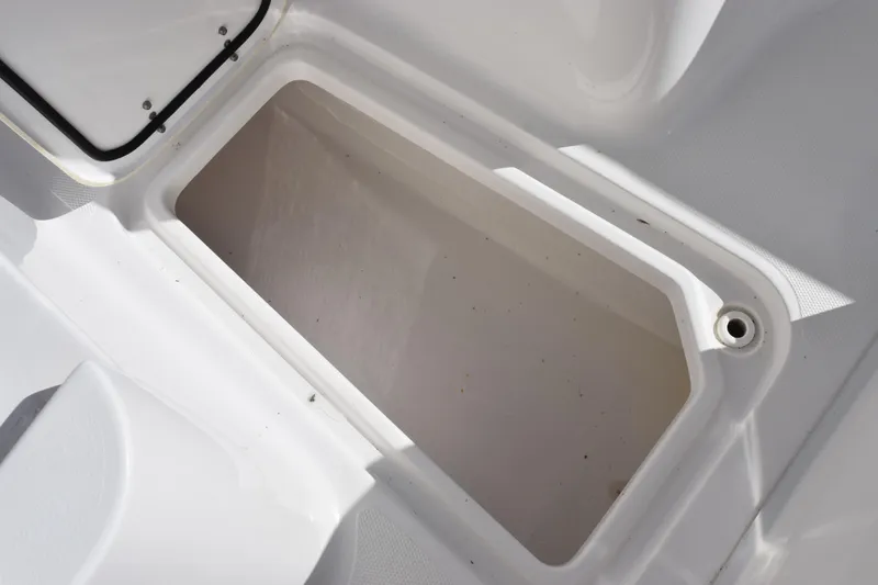 Slide: The Image of Storage compartment on 2020 Sea Hunt Gamefish 27 Forward Seating boat. - 18