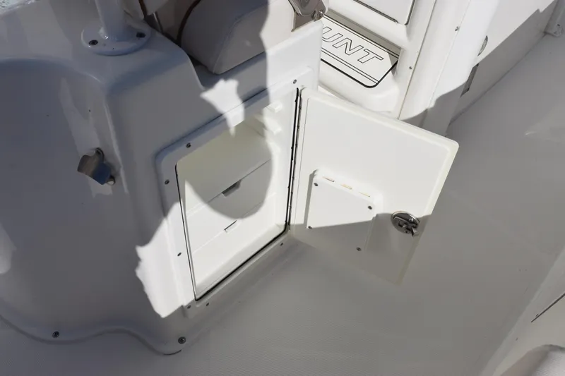 Slide: The Image of Open storage compartment on 2020 Sea Hunt Gamefish 27 Forward Seating boat. - 23