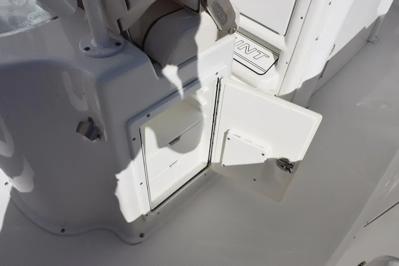 Slide: The Image of Open storage compartment on 2020 Sea Hunt Gamefish 27 Forward Seating boat. - 24